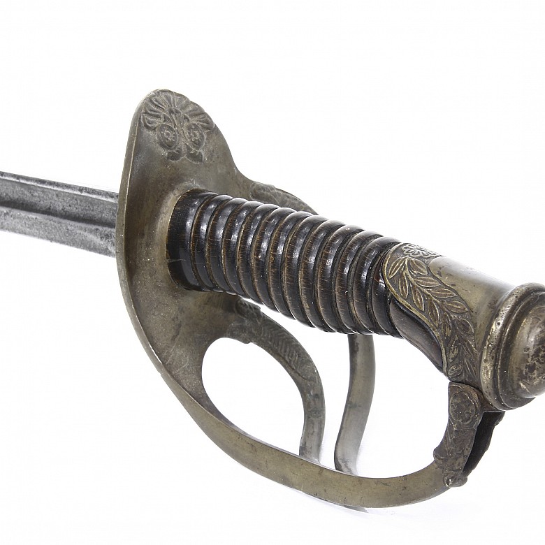 Bronze sword with animal horn handle.
