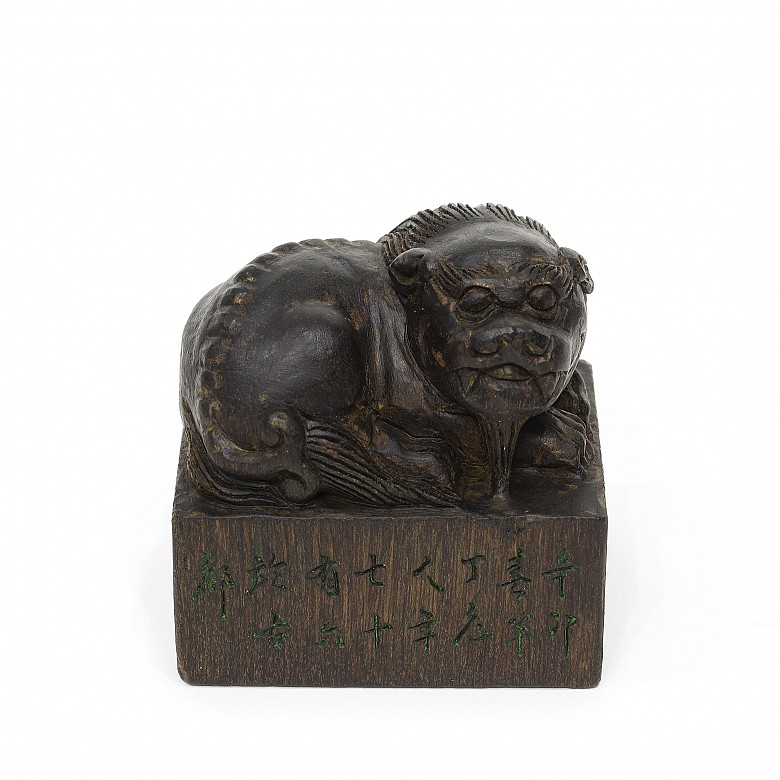 Wooden stamp with carved foo lion, 1951.