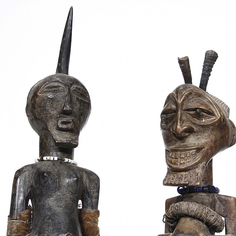Two sculptures of African warriors.