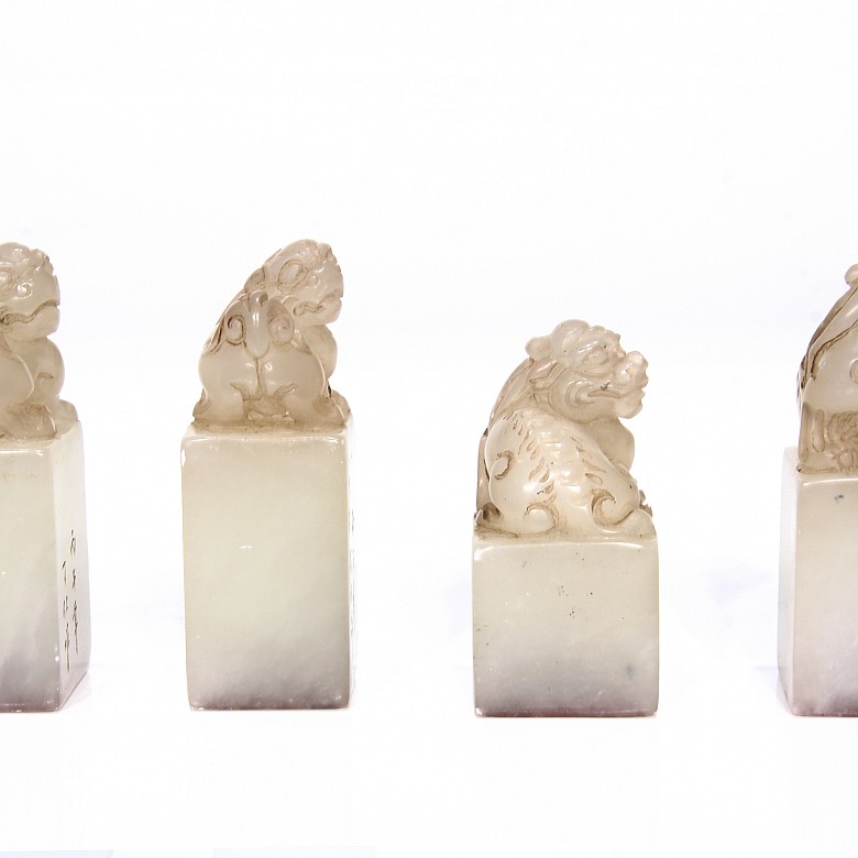 Four carved jade stamps, 20th century