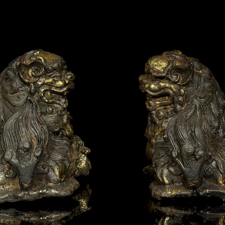 Pair of polychrome Chinese lions.