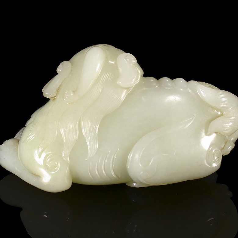 Carved white jade figure,