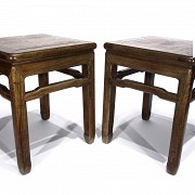 Pair of carved wooden stools, 20th c.