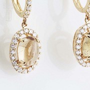 Earrings in 18k yellow gold with tourmalines and diamonds.
