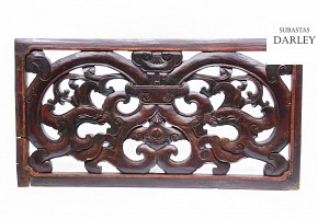 Decorative carved wooden panel.