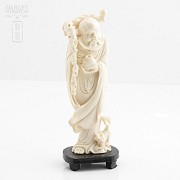 Figure of an elder carved in ivory