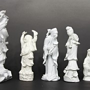 Group of six chinese white porcelain figures, 20th century.