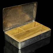 Silver box with decorations