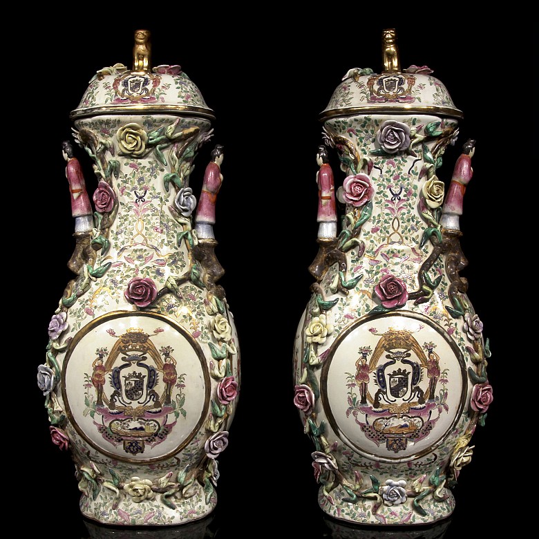 Pair of vases with reliefs.