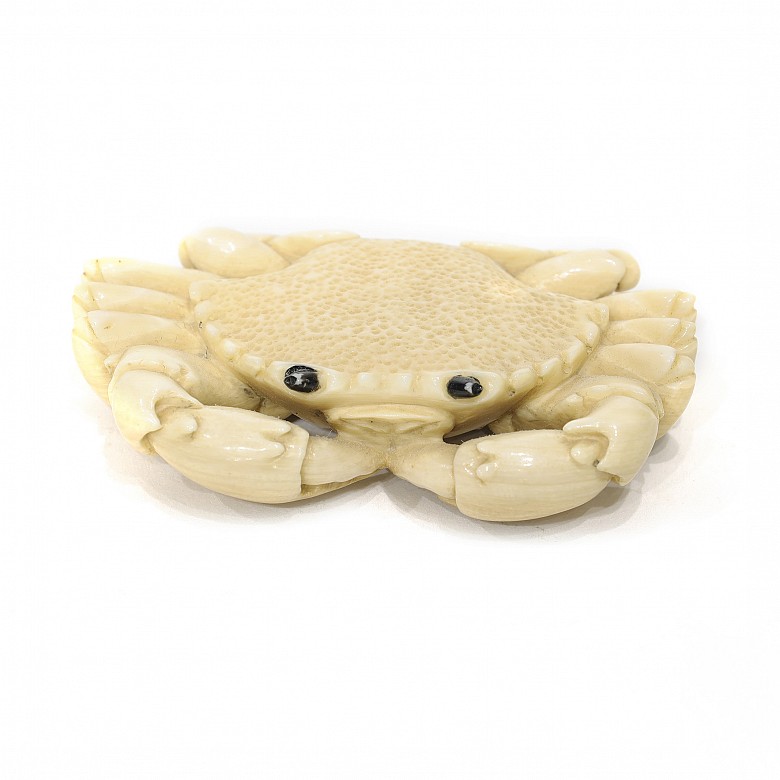 Crab carved from mammoth bone.