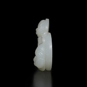 A carved jade abundance amulet, Qing dynasty