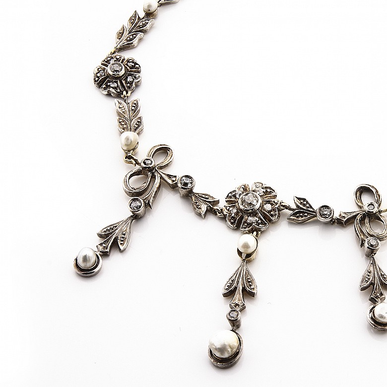 Necklace with cultured pearls and diamonds, circa 1910.
