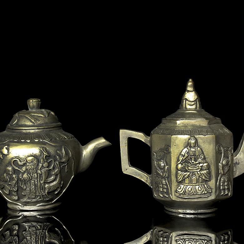 Two metal teapots, China, 20th century
