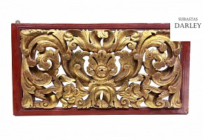 Carved wooden lintel with acanthus scrolls, Bali, Indonesia.