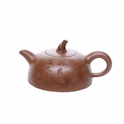 Clay Yixing teapot.