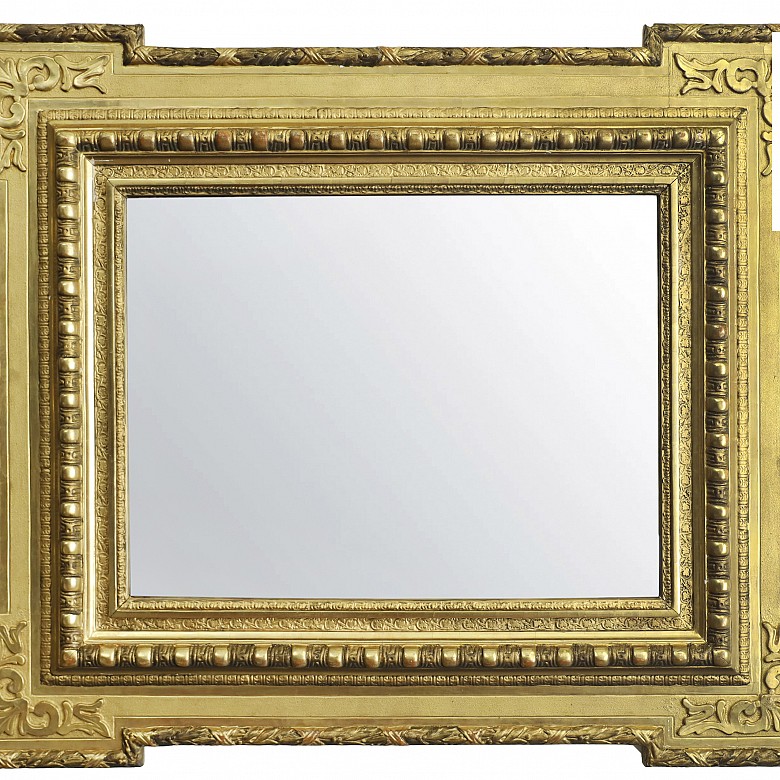 Wooden frame carved and gilded with mirror, early 20th century
