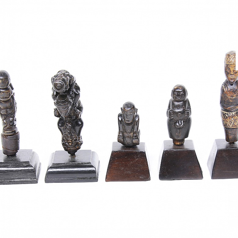 Lot of five handles from Kris, Indonesia, 19th-20th centuries.
