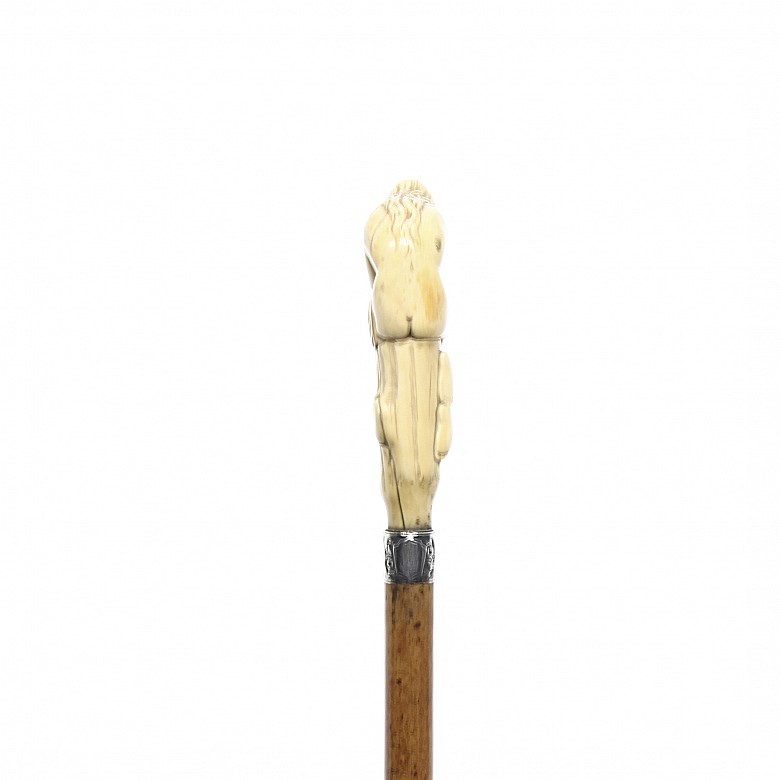 Wooden cane and fist in the shape of a woman, pps.s.XX