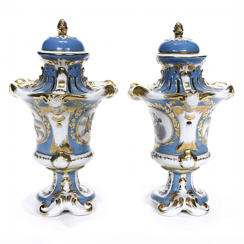 Pair of European porcelain lidded vases, 20th century