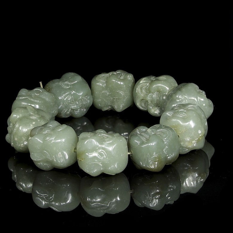 Jade bracelet with Buddha heads, 20th century