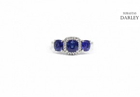 18k white gold ring with sapphires and diamonds.