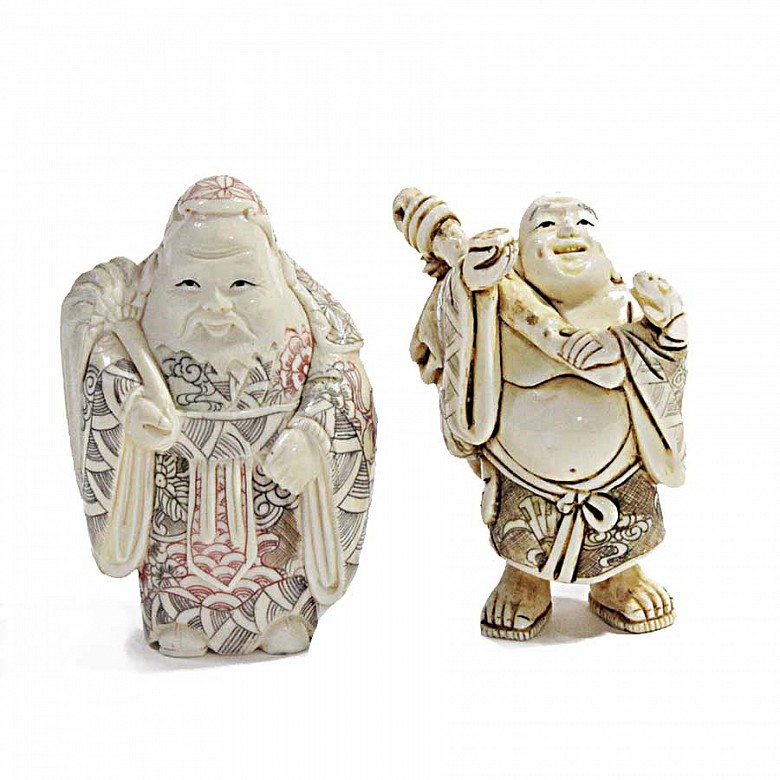 Two ivory Buddhas