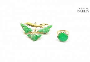 Set in 14k yellow gold with jade.