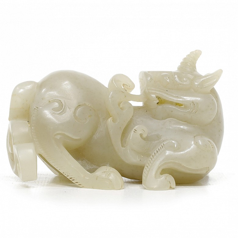 Carved celadon jade dog, Qing dynasty.