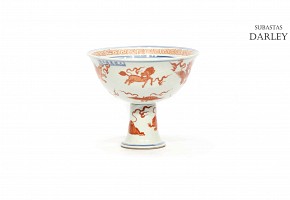 Blue and white stem cup, China, 20th century. Decorated with red 
