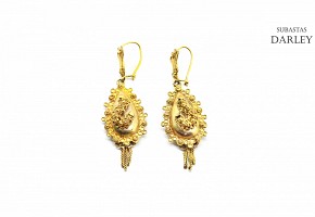 14k yellow gold earrings.