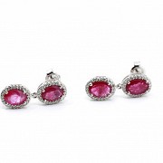 Earrings in 18k white gold with rubies and diamonds.