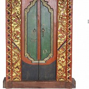 A carved and painted wooden Indonesian temple doors, 19th - 20th century