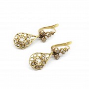 18k yellow gold earrings with old-cut diamonds.