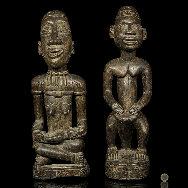Two African carved wooden figures, Yoruba style, 20th century