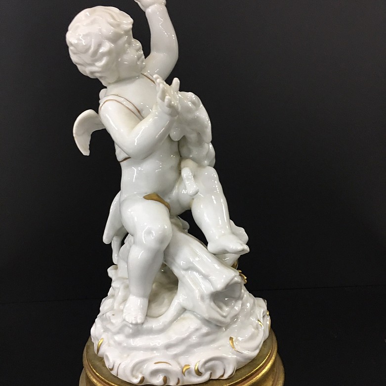 White ceramic angel figure, painted with gold leaf. - 4