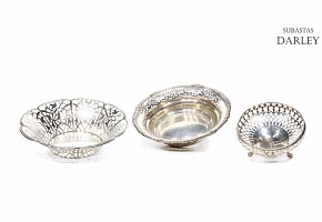 Lot of three silver trays with openwork edge.
