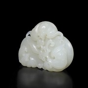 A carved jade abundance amulet, Qing dynasty
