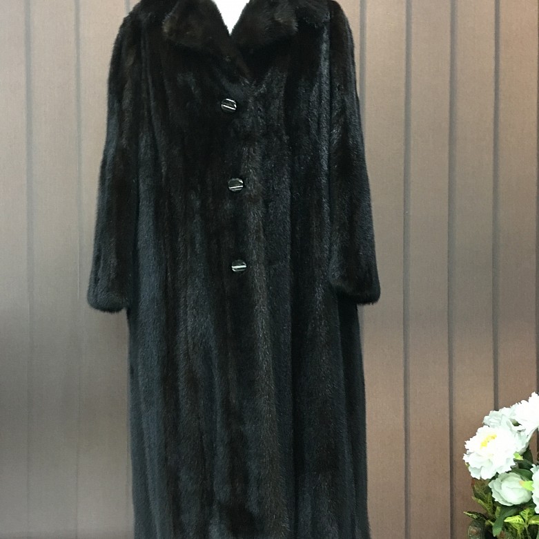 Nice mink fur coat dark brown color and long cut.