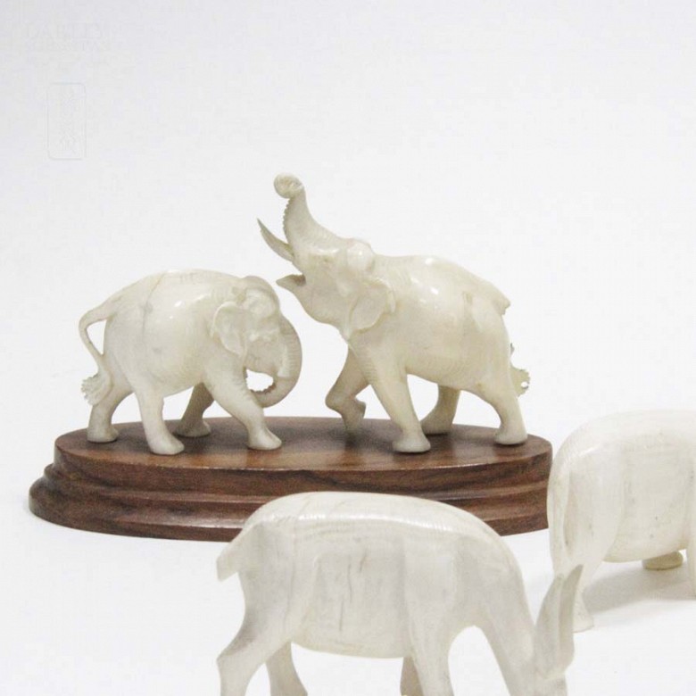 9 ivory figures - 9