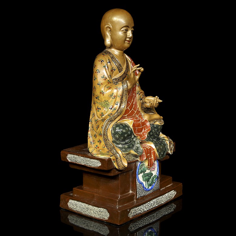 Buda porcelana con firma 