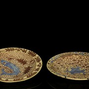 Two plates with fish, metallic lustre from Manises, 20th century
