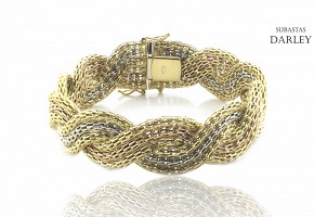Braided bracelet in 18k gold
