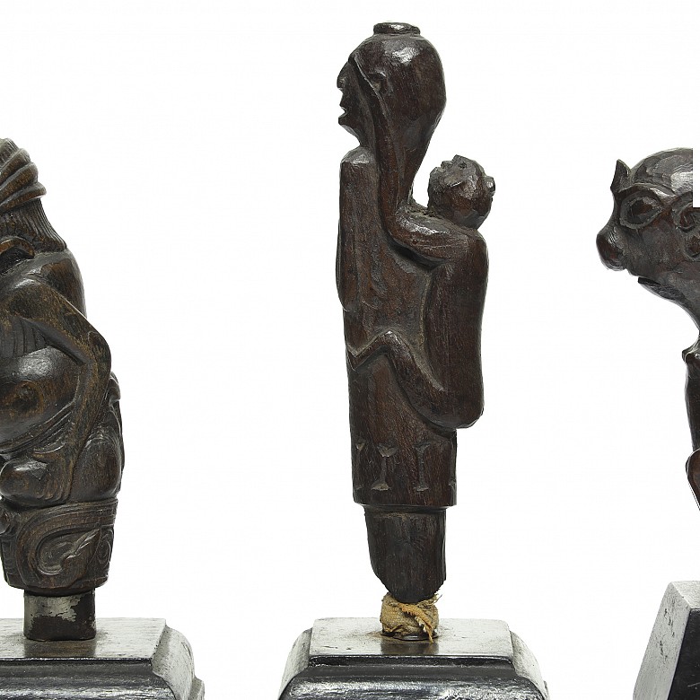 Four wooden Kris handles, Indonesia, 19th - 20th century - 6