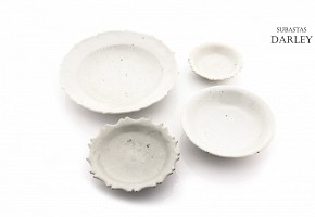 Lot of white glazed porcelain plates, Ming dynasty, 17th century