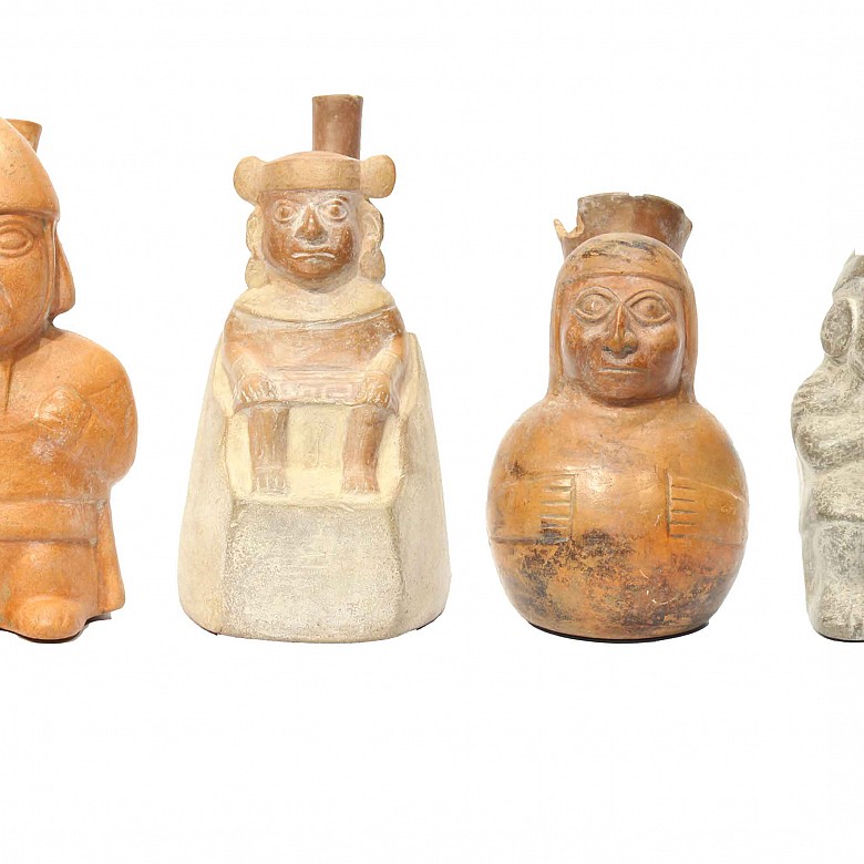 Lot of four kings shaped terracotta containers