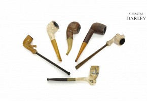 Lot of six pipes made of various materials, early 20th century