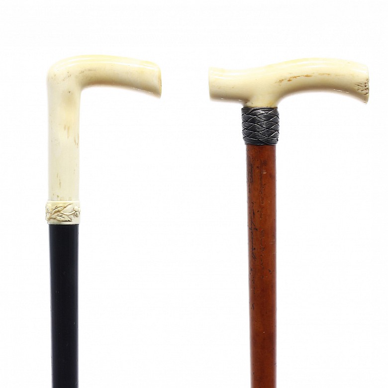 Pair of canes with carved ivory head, early 20th century