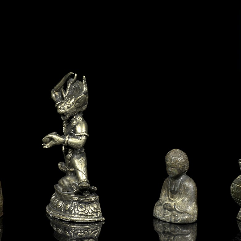 Small bronze figures, Asia.