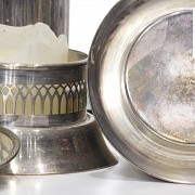 Set of Bulgari silver candleholders and other candleholders and plates, 20th century