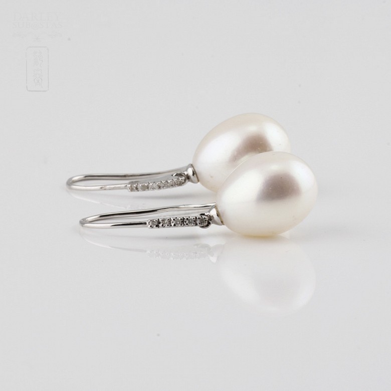pendientes con perla blanca y  diamantes de 18k - 1